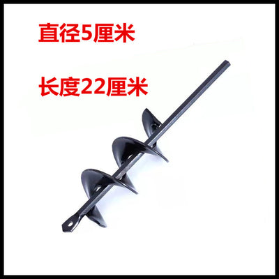 Planting auger drill attachment boring a hole in garden soil